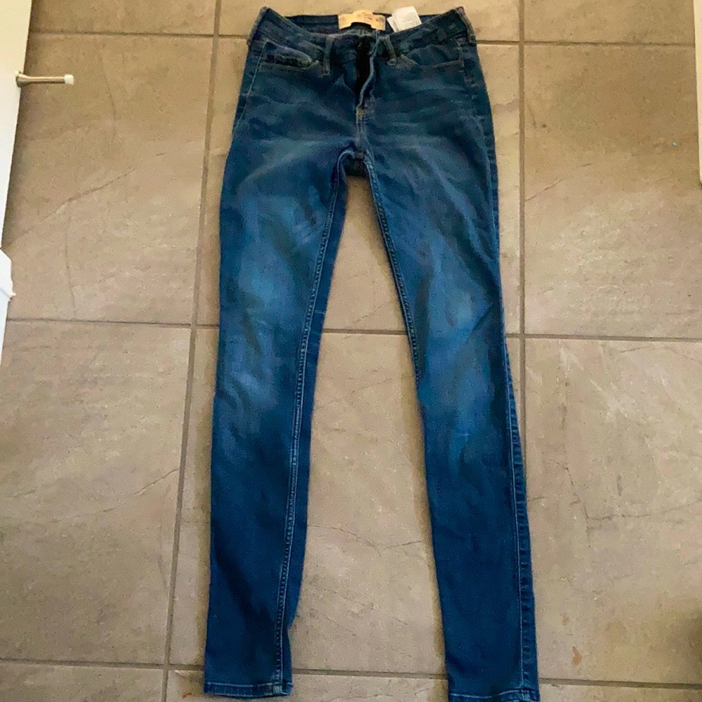 Faded dark blue jeans